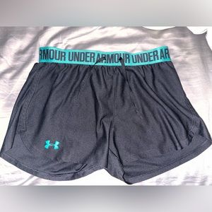 Black and green Under Armour shorts